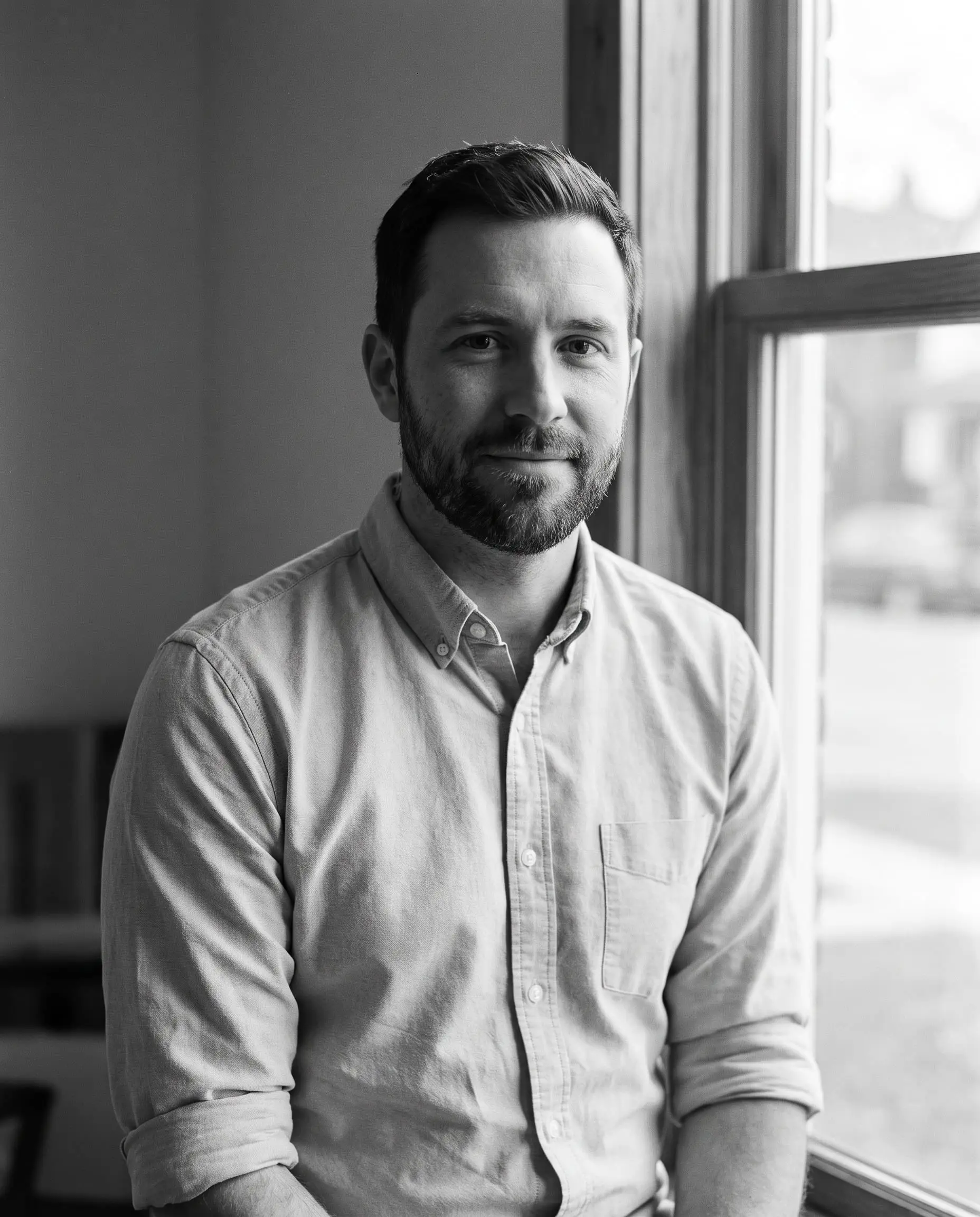 Rafael Costa, mortgage associate in Calgary, black-and-white portrait